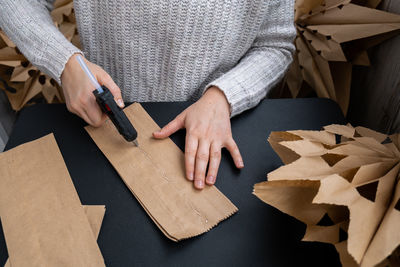 Midsection of man working at home
