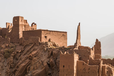 Old ruins of building against clear sky