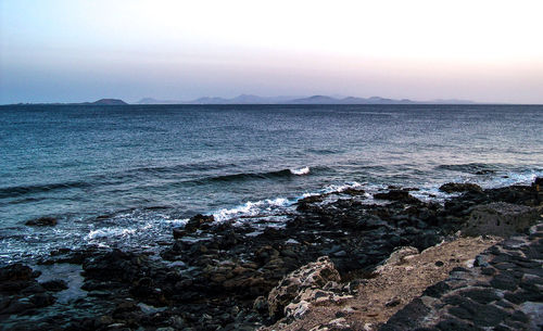 Scenic view of sea against clear sky