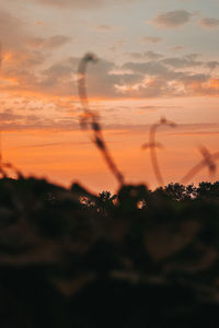 Scenic view of silhouette landscape against sky during sunset