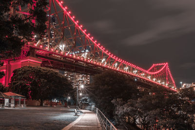 View of illuminated bridge at night