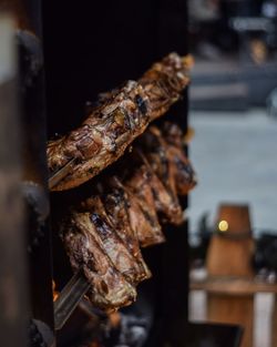 Close-up of meat on barbecue grill