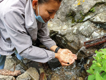 High angle view of women standing on rock