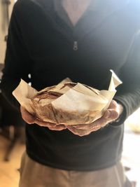 Close-up of man holding ice cream