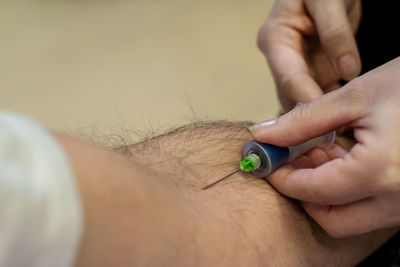 Close-up of people holding hands