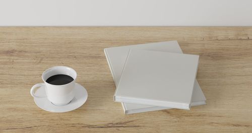 High angle view of coffee cup on table