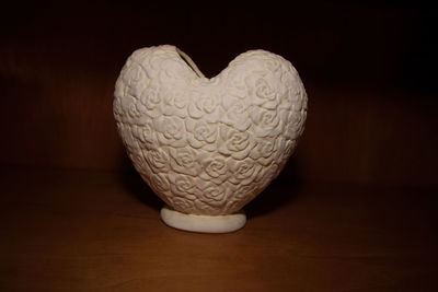 Close-up of heart shape on table