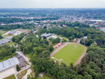 High angle view of outdoor football field in city 