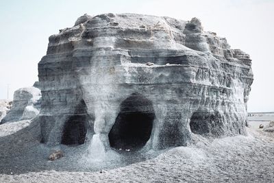 View of rock formation against sky
