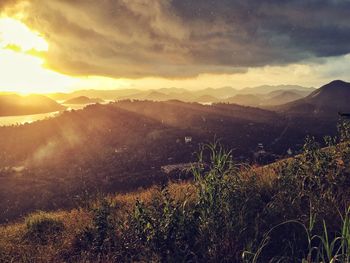 Scenic view of landscape against sky during sunset