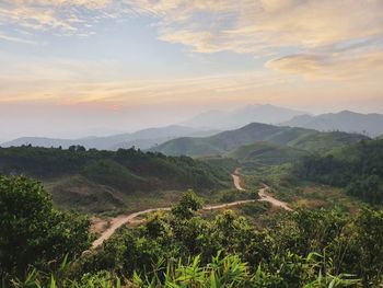 Scenic view of landscape against sky during sunset
