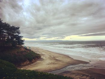Scenic view of beach against sky
