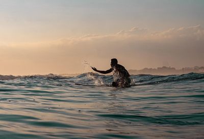 Man swimming in sea