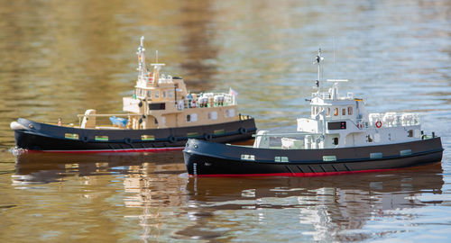 Remote controlled ship model is remote controlled on a lake