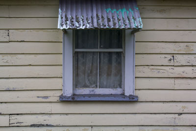 Close-up of closed window of building