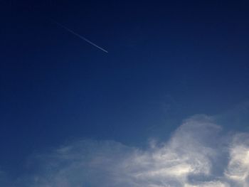 Low angle view of vapor trail in sky