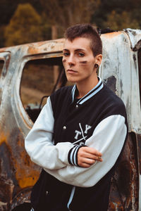 Portrait of young man standing outdoors