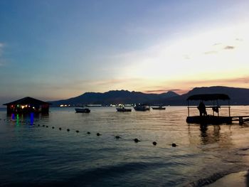 Scenic view of sea against sky at sunset