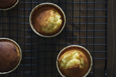 There are several delicious lemon honey cupcakes just made on the table