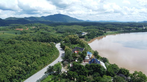 High angle view of road amidst mountains against sky