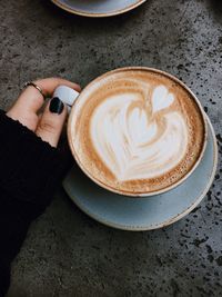 High angle view of cappuccino coffee cup