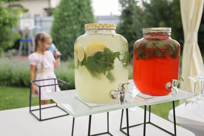 Close-up of drink in glass jar on table