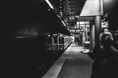 Train at railroad station at night