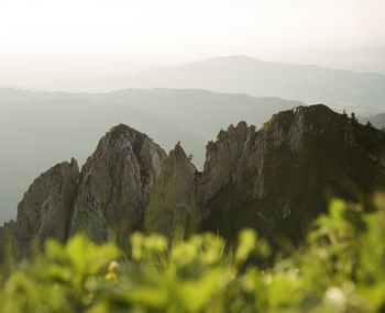 Scenic view of mountains against sky during sunset