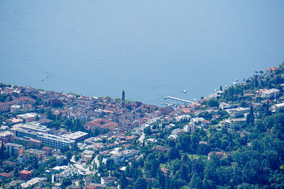 High angle view of townscape by sea