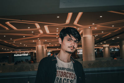 Portrait of young man looking away