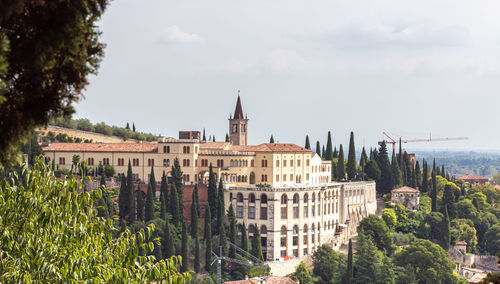 Buildings in city against sky