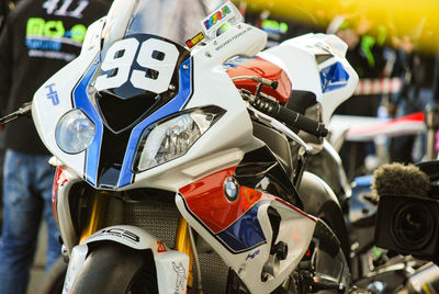 Close-up of motorcycle on street