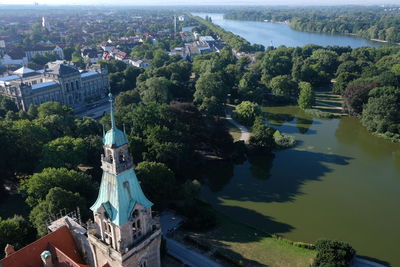 High angle view of river amidst buildings in city