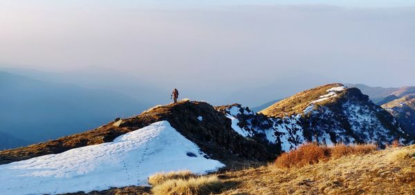 Man on mountain during winter