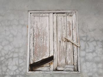 Close-up of old wooden door of building