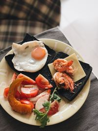 High angle view of breakfast served on table