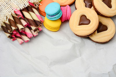 High angle view of multi colored candies on table