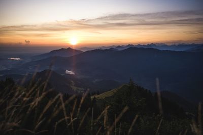 Scenic view of mountains against sky during sunset