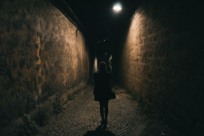 People walking in tunnel