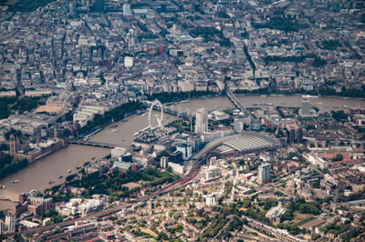 High angle view of buildings and river in city