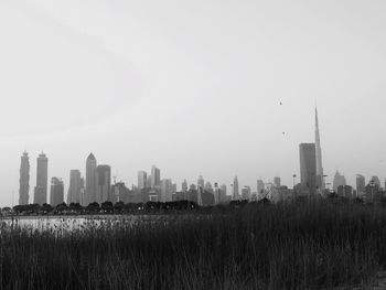 View of city skyline against clear sky