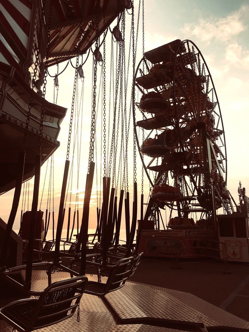 LOW ANGLE VIEW OF AMUSEMENT PARK RIDE