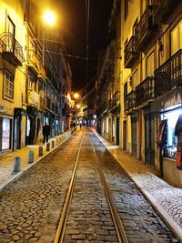 Illuminated street at night