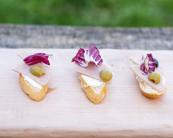 Close-up of sushi on cutting board