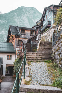 Houses by road in town