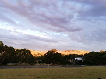 View of golf course against sky