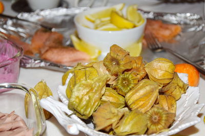 Close-up of fruits in plate on table