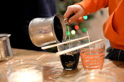 A close up image of home made candle making process.