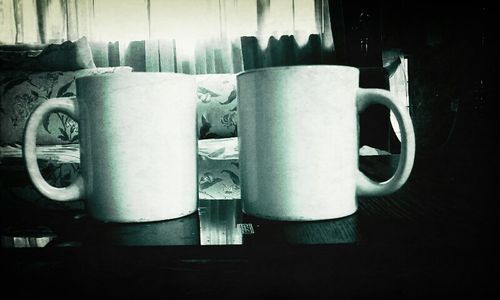 Close-up of coffee cup on table