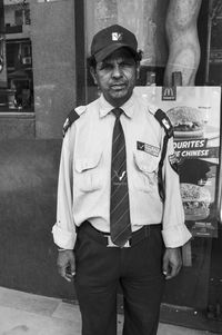 Portrait of man standing outdoors